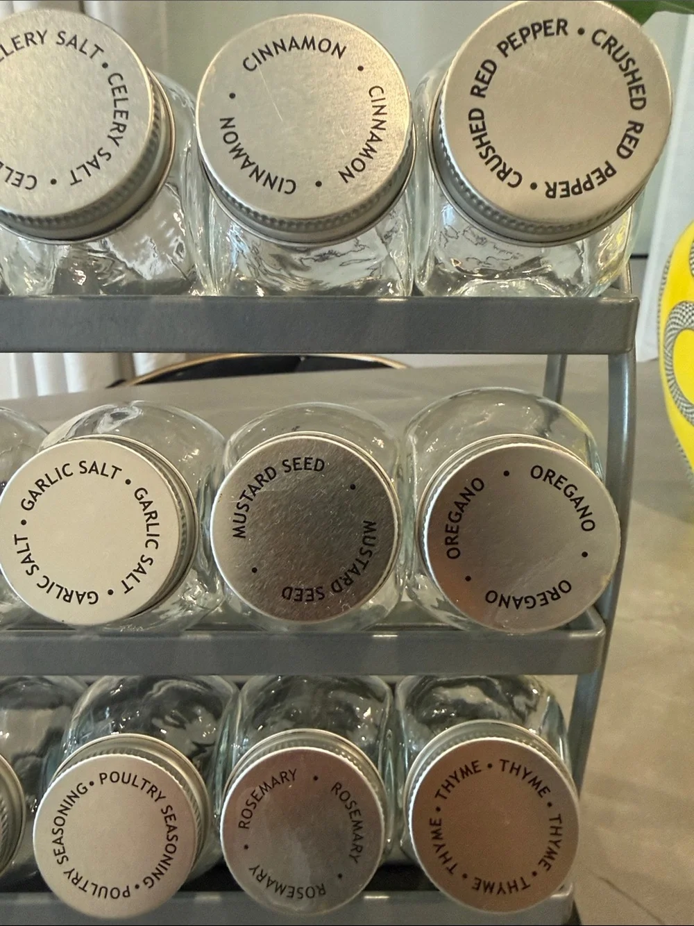 Crate&Barrel Black Spice Rack with Silver Lidded Jars
